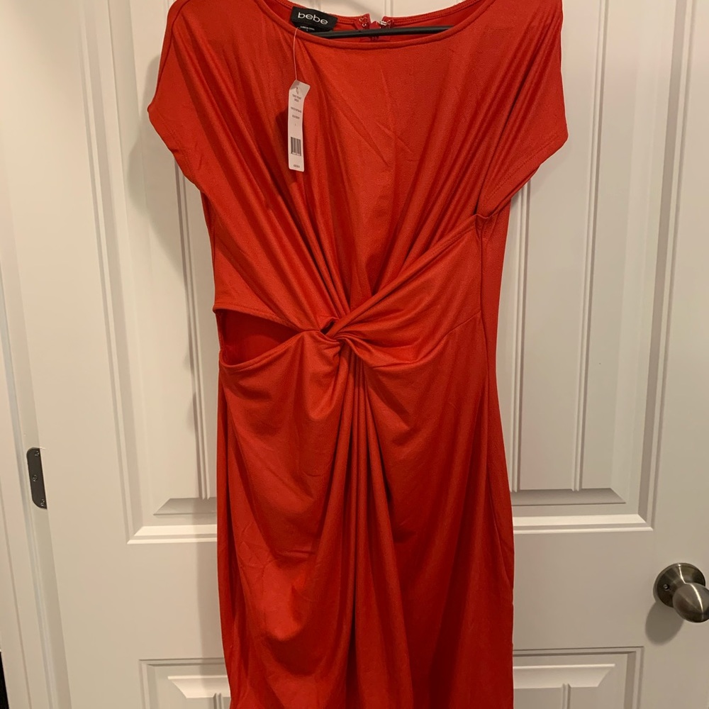 Red BeBe short sleeved dress,midsection coverage.